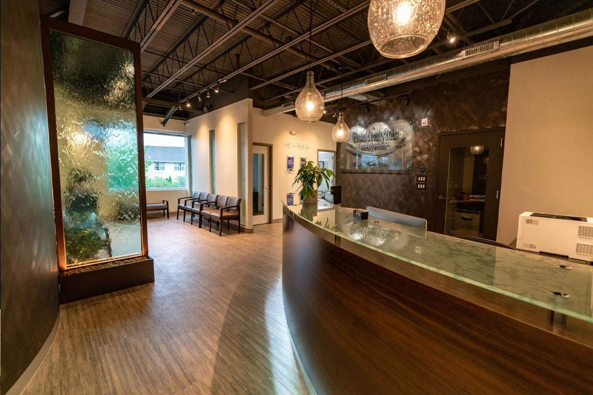 Dental practice team reviewing front desk privacy, screen sightlines, patient flow, paperwork, printers, and HIPAA physical safeguards
